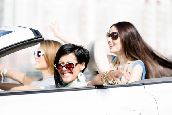 Group of girls in the white car — Stock Photo, Image