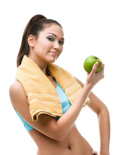 Αθλητική γυναίκα χέρια πράσινο μήλο — Φωτογραφία Αρχείου