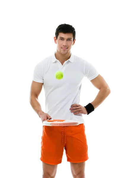 Sporty man playing tennis — Stock Photo, Image