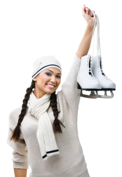Smiling female figure skater hands skates — Stock Photo, Image