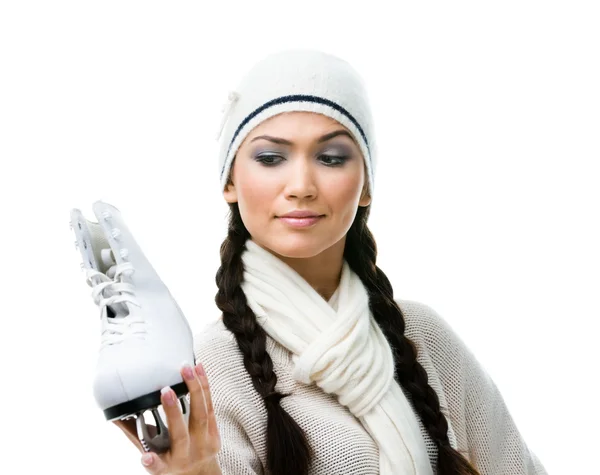 Female figure skater thoughtfully looks at the skate — Stock Photo, Image