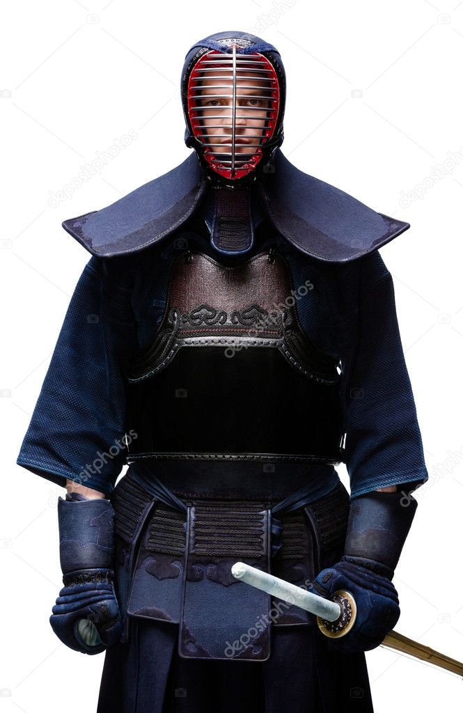Portrait of equipped kendo fighter with shinai