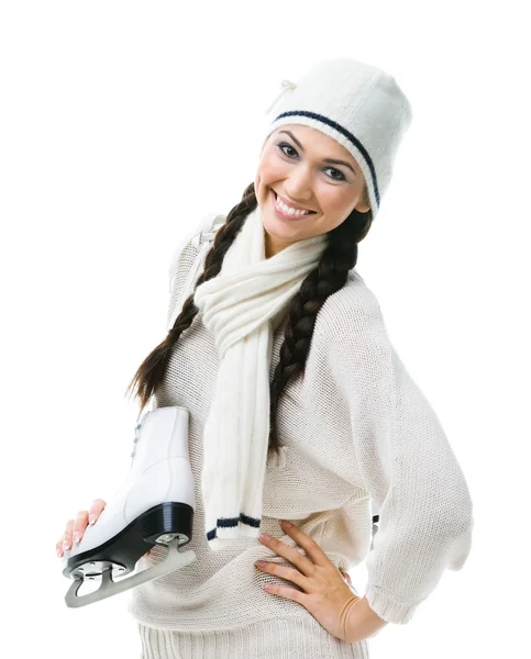 Smiling female figure skater holds skates — Stock Photo, Image