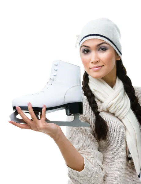 Pretty female figure skater shows one skate — Stock Photo, Image