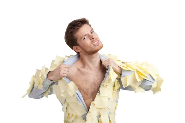 A young man ripping off his shirt — Stock Photo, Image