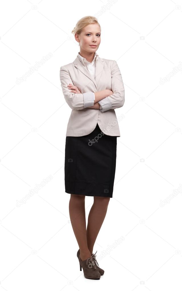 Attractive attractive business woman in a light beige suit