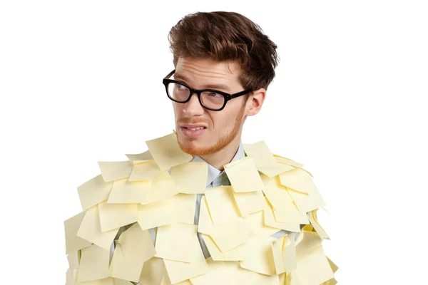 Young man with a glasses covered with yellow stickers — Stock Photo, Image