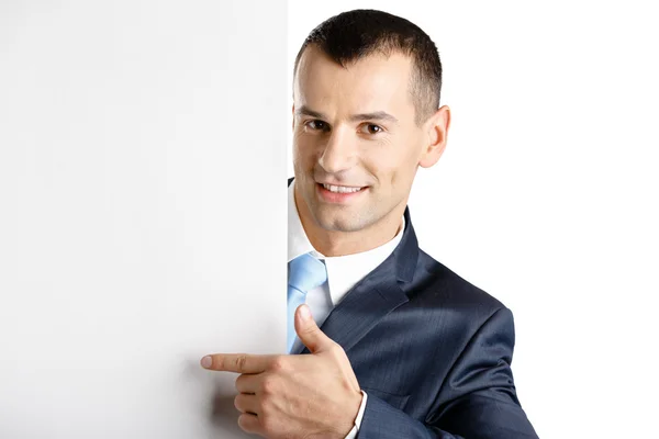 Manager points at paper copy space — Stock Photo, Image