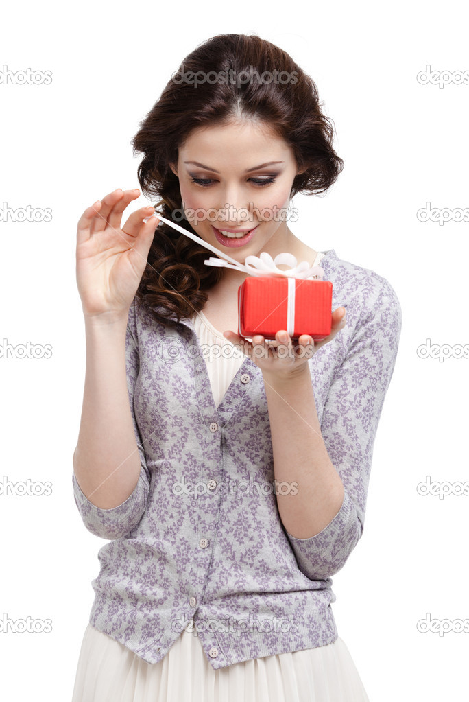 Young lady opens her present