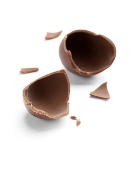 Broken into pieces chocolate egg — Stock Photo, Image