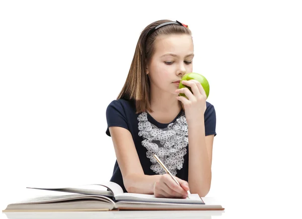 Leerling is het eten van een rijpe appel — Stockfoto