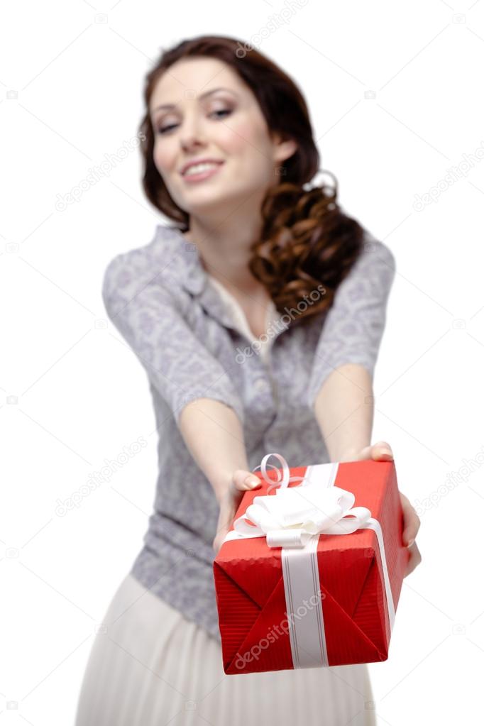 Young woman offers a gift