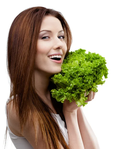 Woman keeps fresh lettuce leaves Royalty Free Stock Images
