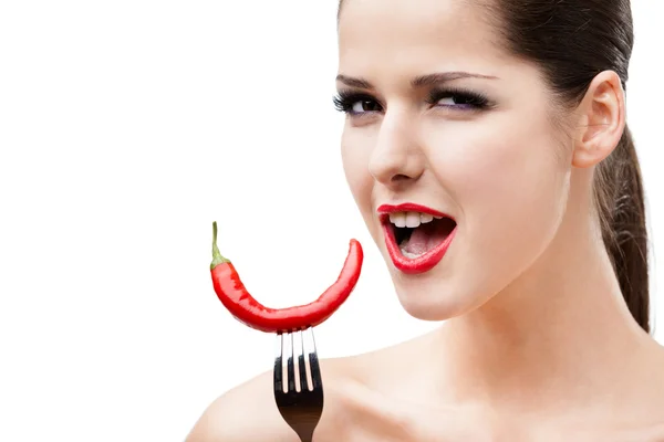 Woman with cayenne on fork — Stock Photo, Image