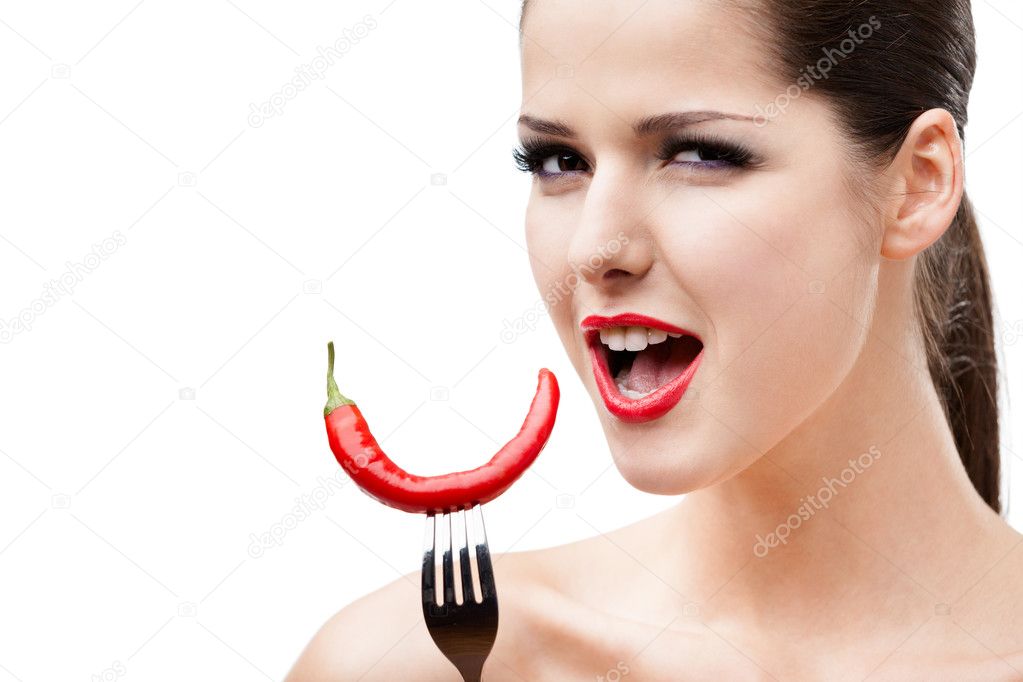 Woman with cayenne on fork