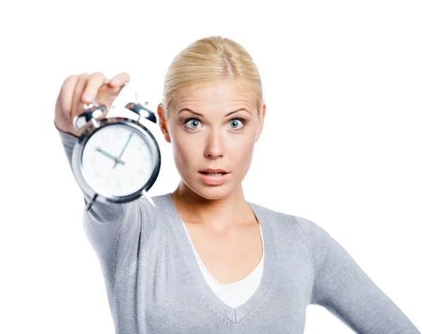 Woman showing the alarm clock — Stock Photo, Image