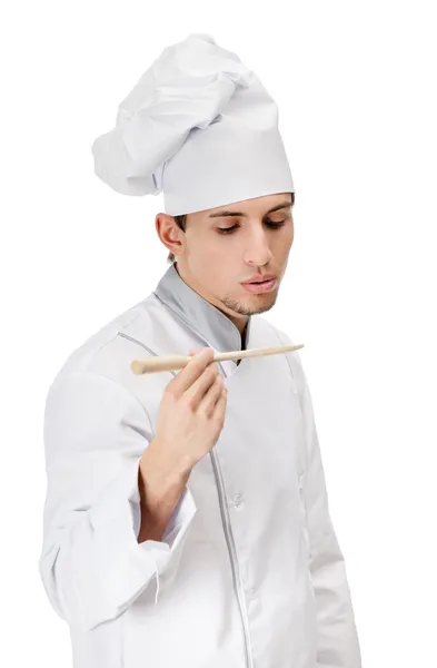 Chef cook tastes the prepared dish — Stock Photo, Image