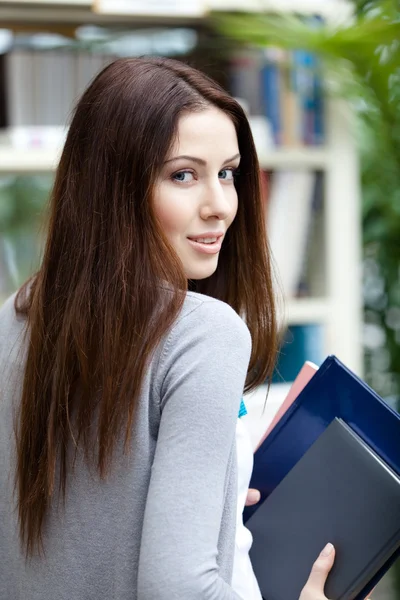 Undergraduate with notebooks — Stock Photo, Image