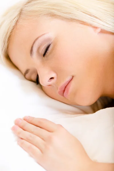 Close up of sleepy woman in bed — Stock Photo, Image