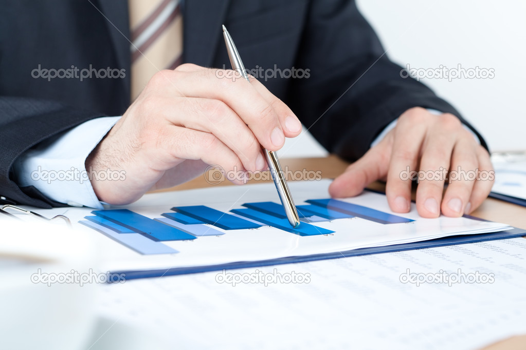 Business man working with diagrams