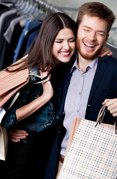 Lolling couple is in the shop — Stock Photo, Image