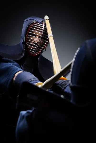 Close up view of competition of two kendo fighters — Stock Photo, Image