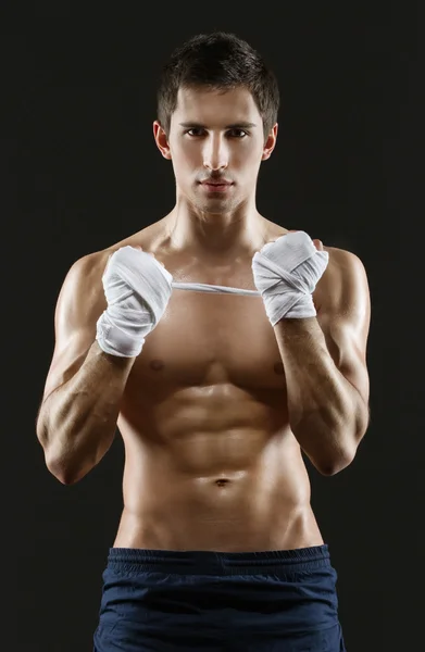 Half-length portrait of hand wrapping sportsman — Stock Photo, Image