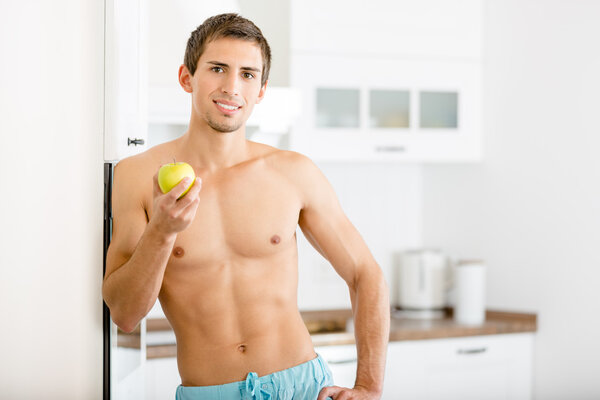 Half-naked man with apple
