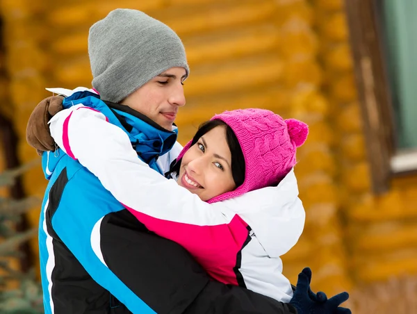 Half-length portrait of embracing young couple — Stock Photo, Image