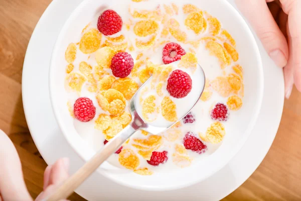 Top view of the plate with cereals, milk and strawberry — Stock Photo, Image
