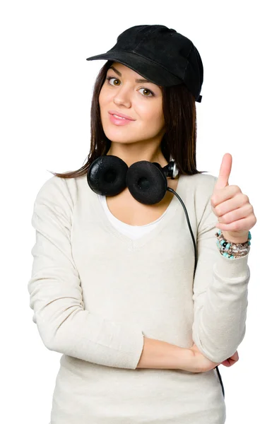 Youngster in peaked cap thumbs up — Stock Photo, Image