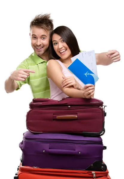 Couple with trunks and tickets — Stock Photo, Image