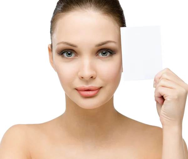 Nude girl hands copyspace card near her face — Stock Photo, Image