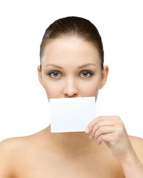 Sexy girl hands copyspace card in front of her mouth — Stock Photo, Image