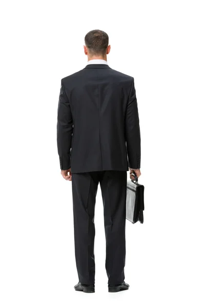 Full-length backview of businessman with case — Stock Photo, Image