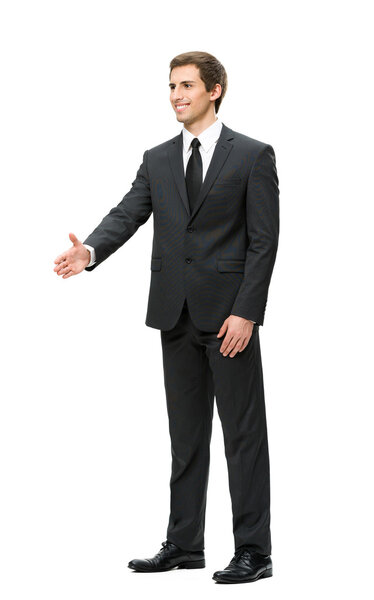 Full-length portrait of businessman handshake gesturing