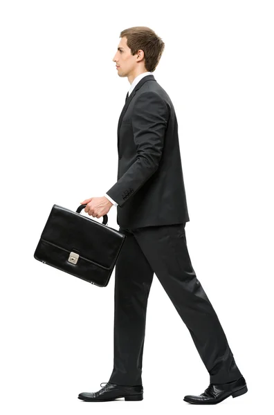 Profile of walking with suitcase business man — Stock Photo, Image