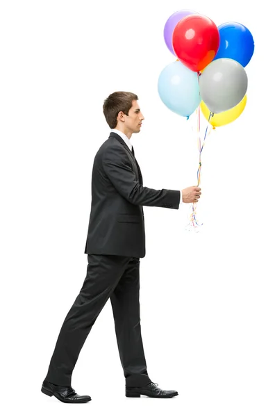 Profil des Gehens mit Luftballons Geschäftsmann — Stockfoto