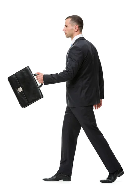Profile of walking with black case business man — Stock Photo, Image