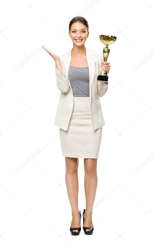 Full-length portrait of business woman with golden cup