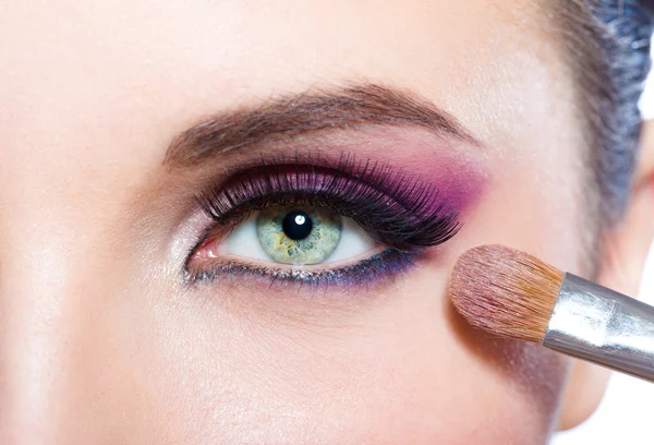 Close up of girl applying brilliant make-up — Stock Photo, Image