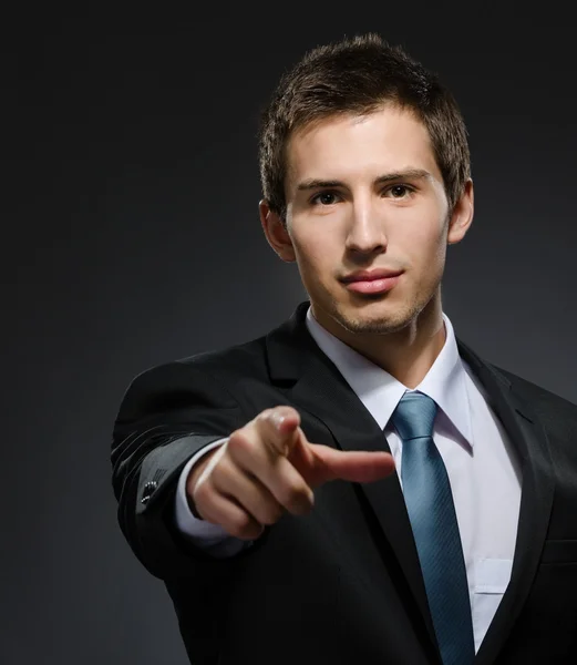 Pointing with finger business man Royalty Free Stock Photos