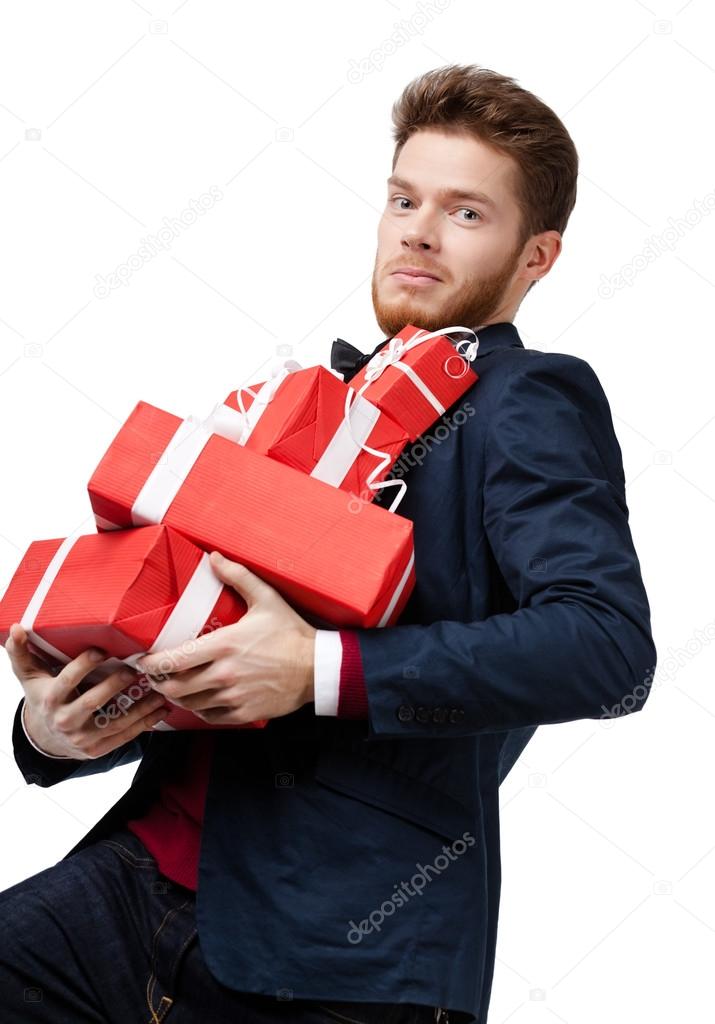 Man carries a lot of presents