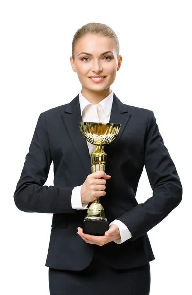 Mujer de negocios manteniendo taza de oro — Foto de Stock