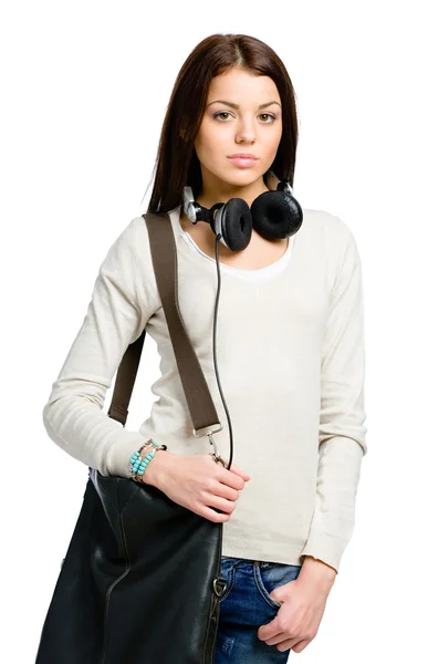 Tonåring med hörlurar och handväska — Stockfoto