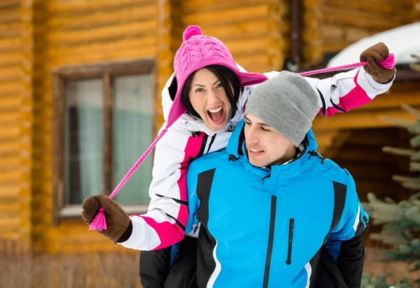 Couple having fun during winter vacations — Stock Photo, Image
