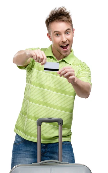 Hombre con baúl de viaje y tarjeta de crédito — Foto de Stock