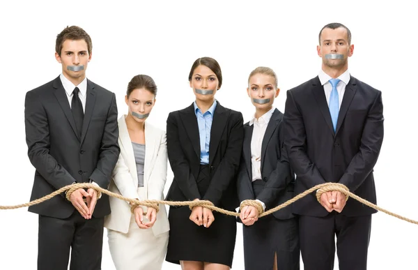 Business people tied with rope — Stock Photo, Image