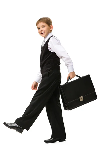 Little businessman walking with case — Stock Photo, Image