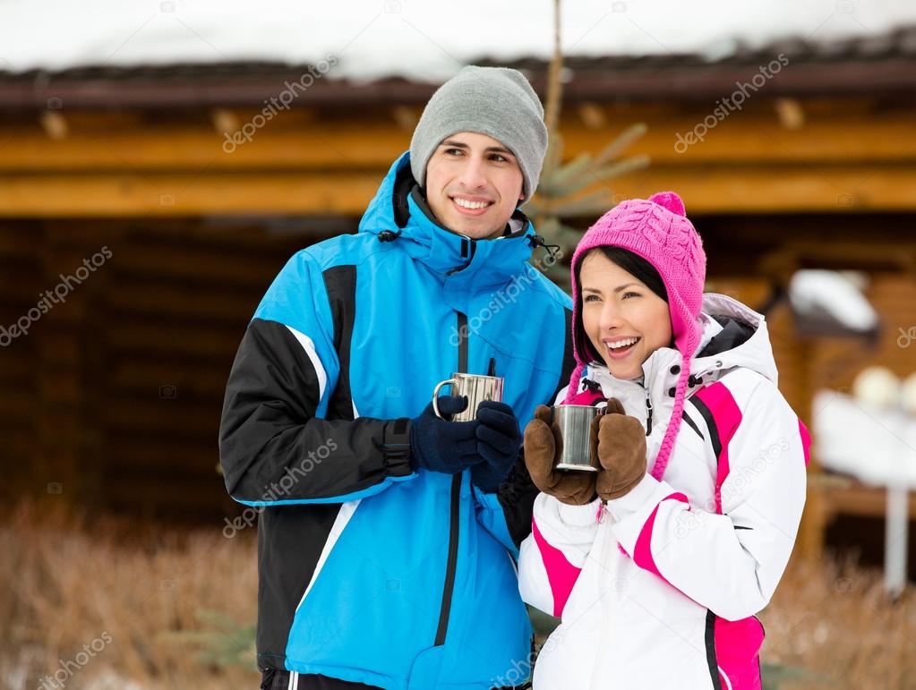 Couple drinks tea outdoors